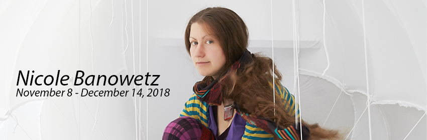 a photo of nicole banowetz in one of her sculptures